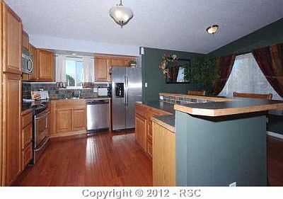 4th image of 5155 Mayweed Ct