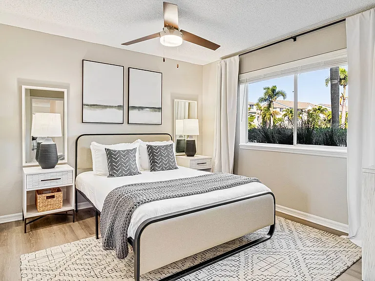 Spacious bedrooms with walk-in closets, large windows, and ceiling fans for ultimate comfort.