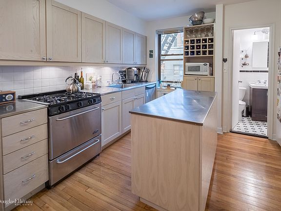 5th image of 50 E 8th St APT 2W