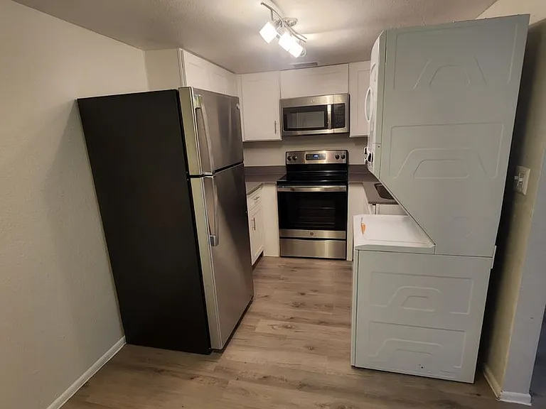 Modern Quarters Apartments — Photo 6