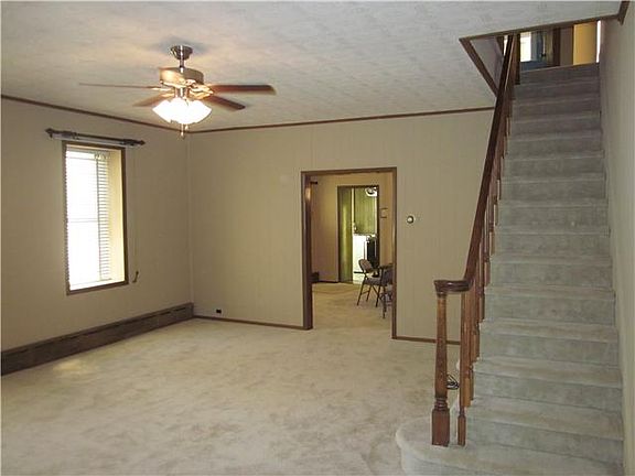 View into DR from LR/ hall stairs to 2nd story