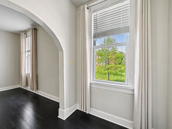 Foyer entrance with natural lighting.