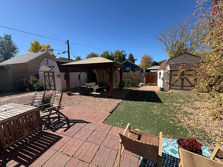 Backyard with pergola, sheds (with electrical) low-maintenance artificial turf lawn