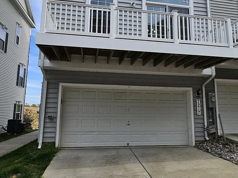 2 car garage with 2 car parking pad for 4 spaces