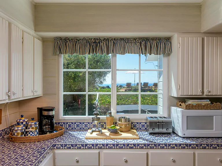 Fully equipped kitchen with ocean view.