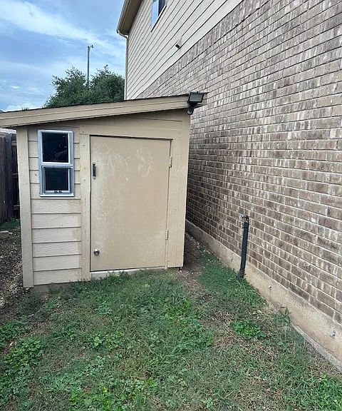 Side shed on concrete slab with lock