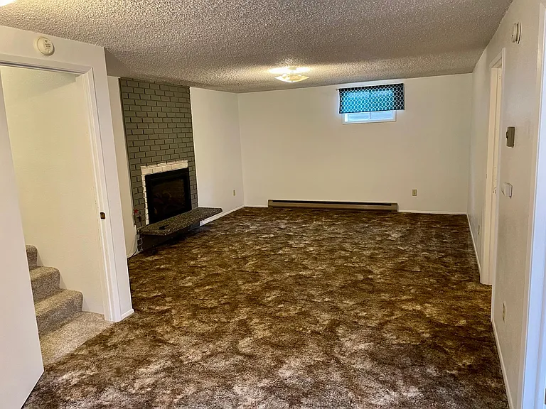 Very spacious with gas insert fireplace.