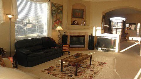 Large family room with gas fireplace and media center!