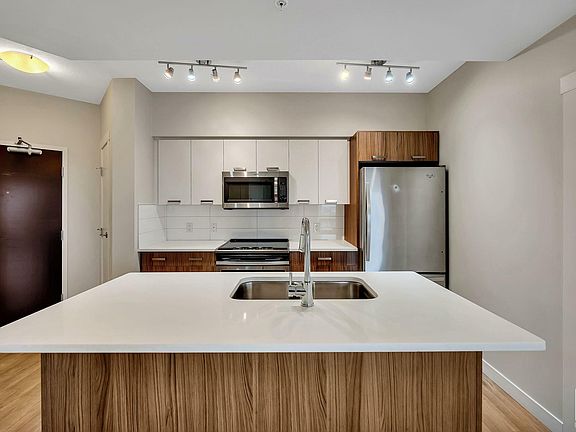 5th image of 10410 102nd Ave NW #1406