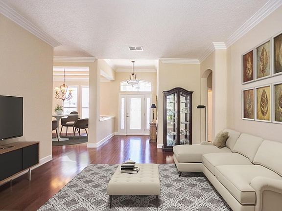 Staged _living room and foyer (2)