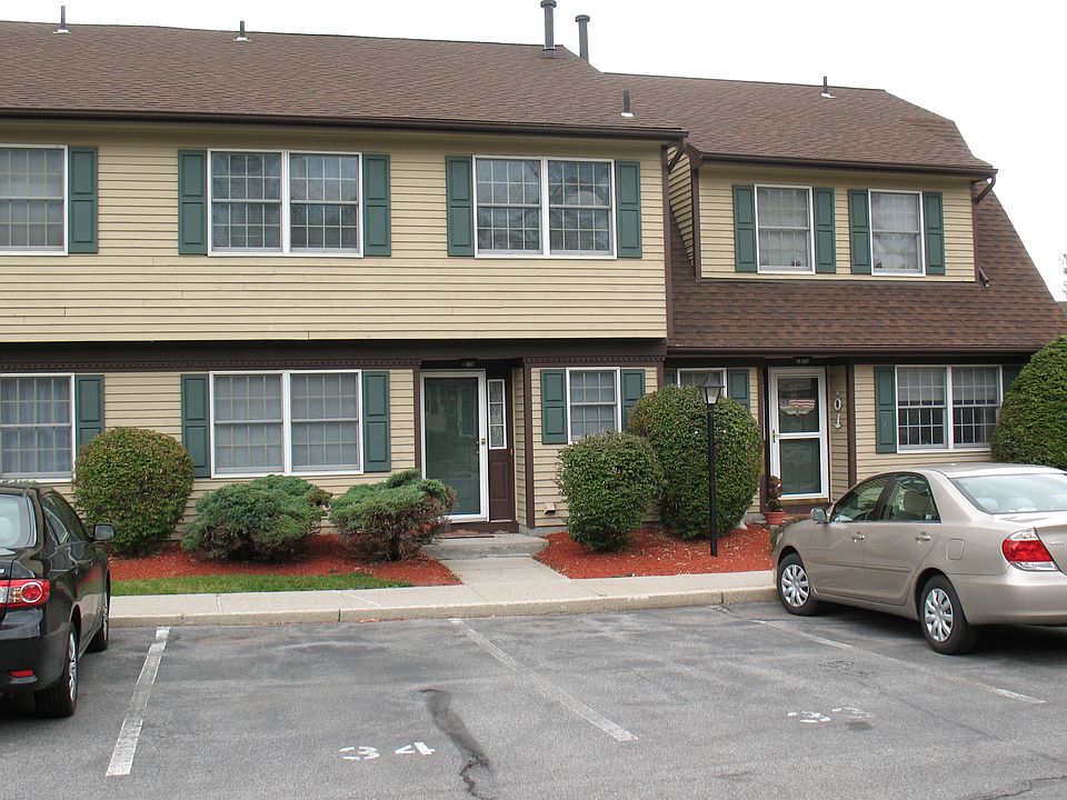 Front Of Unit with 2 designated parking spaces