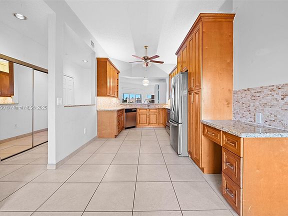 5th image of 7675 Granville Dr #402