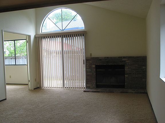 Family room w/fireplace and plenty of light