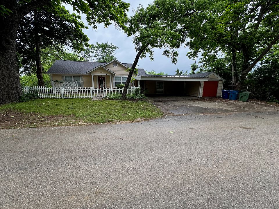 Two front doors. One to private living room. Other from carport can be separate entrance to office.