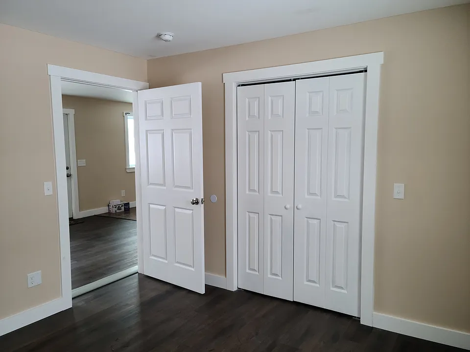 Double doors are bedroom closet