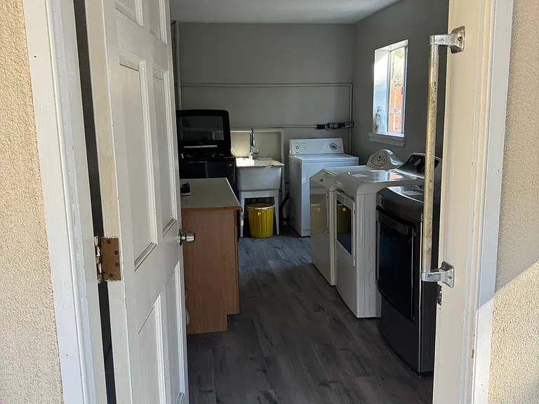 1 of 3 community laundry rooms