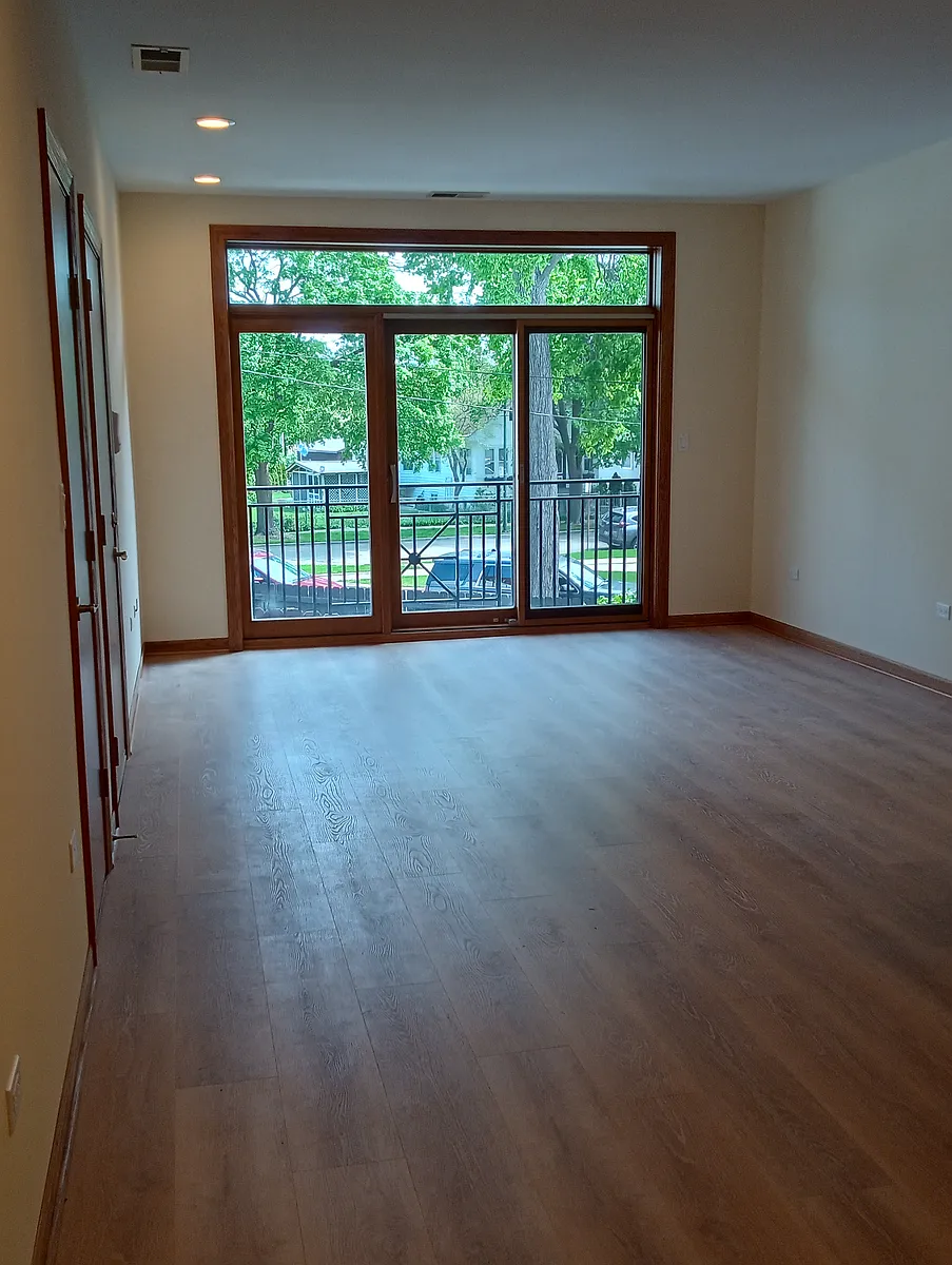 Building Photo - 6811 W Raven St #2N