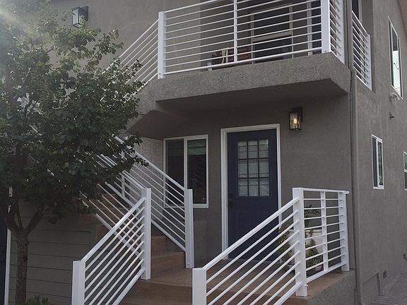 View of entry stairs to upper unit.