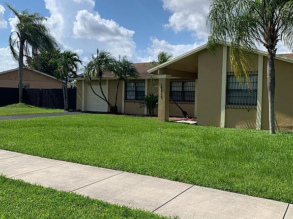 This is the third photo incorporated in the series of five photographs of the front exterior of the subject property.