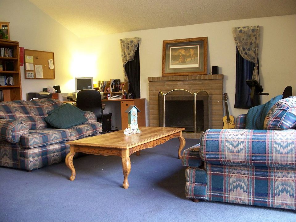 Family Rm (Bldrs Opt) features vaulted ceiling & wood burning fireplace