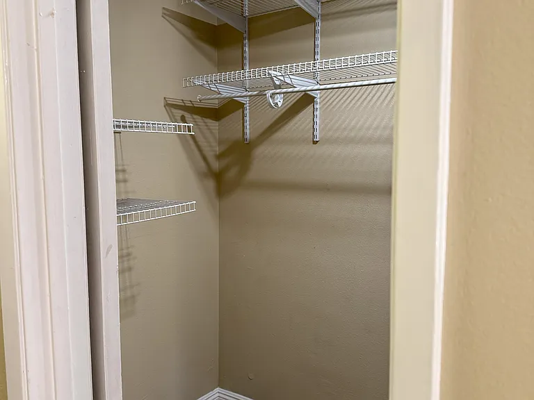One portion of walk-in closet