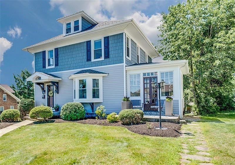 NEW SHAKER STYLE AND LAP SIDING, SHUTTERS, REFINISHED ORIGINAL DOORS, NEW DIMENSIONAL SHINGLE ROOF WITH LIFETIME GUARANTEE, PROF