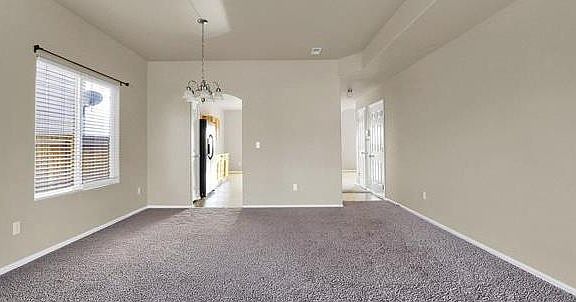 Dining room entrance to kitchen and living room.