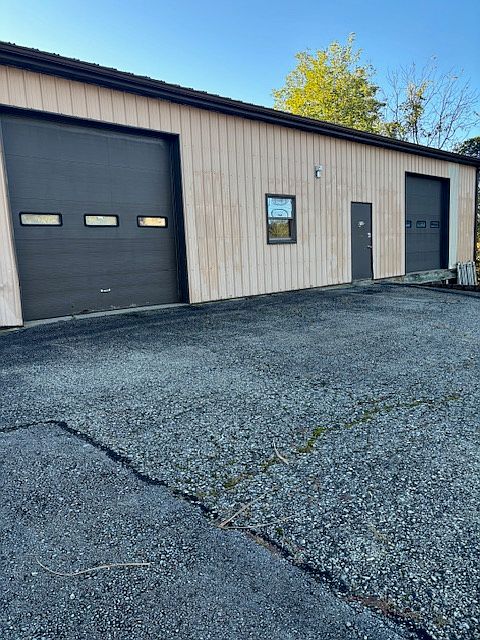 Front of building, 2 garage bays