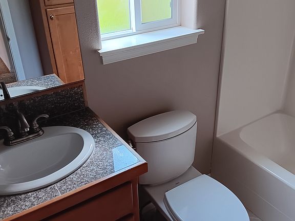Kids bathroom right next to bedrooms 2 and 3 and the kitchen.