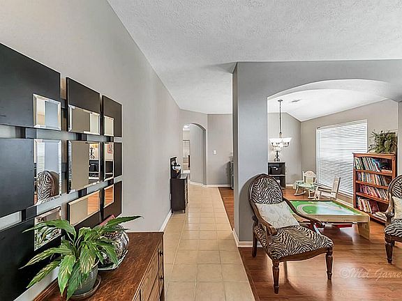 Welcoming entry with laminate wood flooring