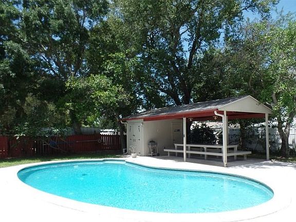 Pool and covered picnic area with storage