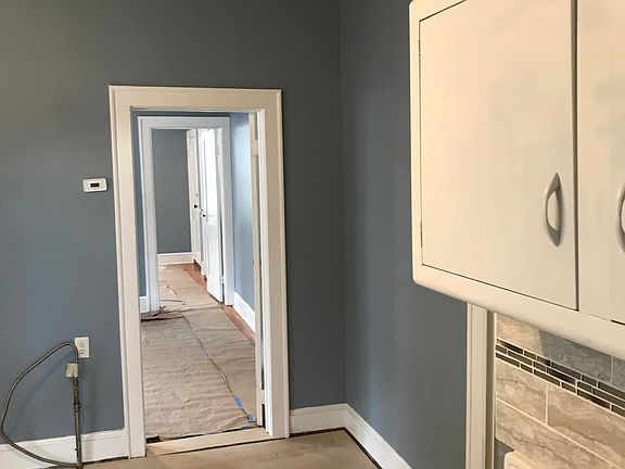 kitchen view toward living-room and bedroom