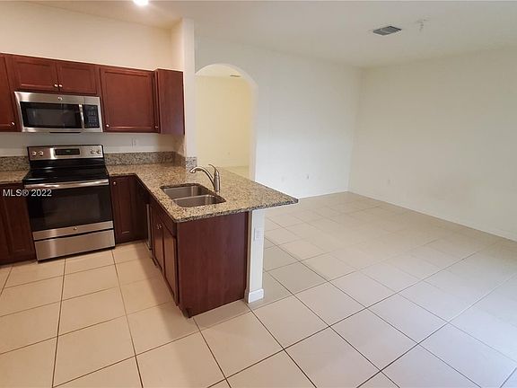 5th image of 9369 W 34th Ct #9369