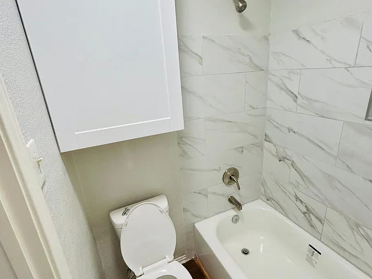 New bath tubs, new tiles around bathtubs, new faucets, new toilets