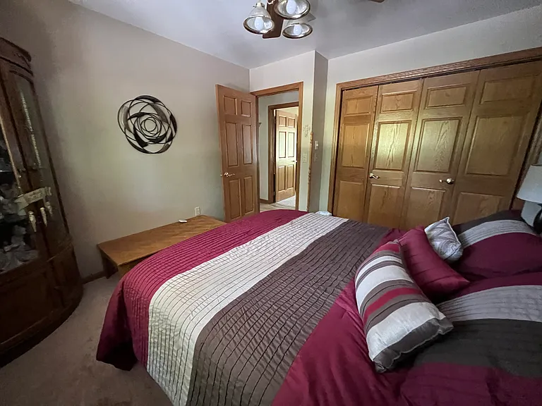 Main Floor second bedroom with queen