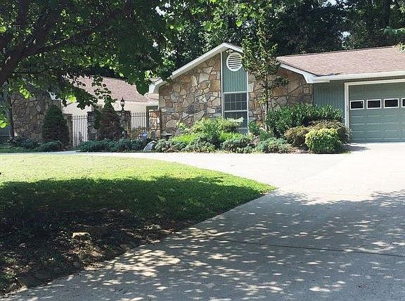 Garage and rounded driveway