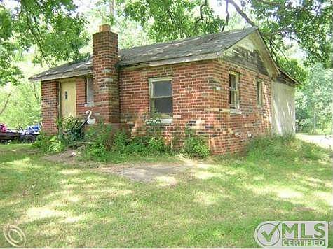 COTTAGE IN BACK OF HOME