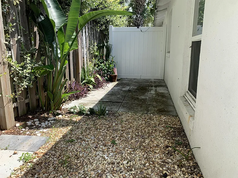 Private, lockable yard behind the unit.