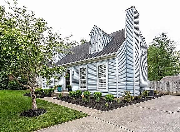 View of House to include 2 car "side by side" parking and back entry through 6' privacy fence to back door
