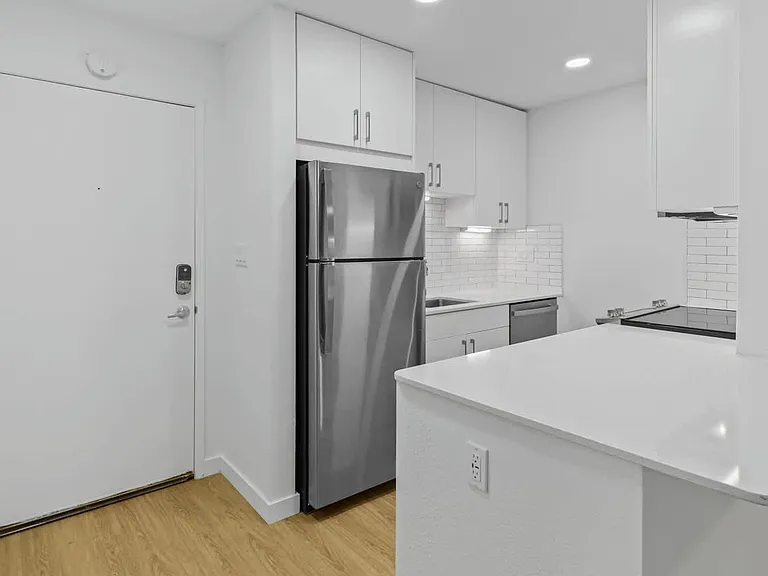Kitchen with Stainless Steel Appliances and Breakfast Bar
