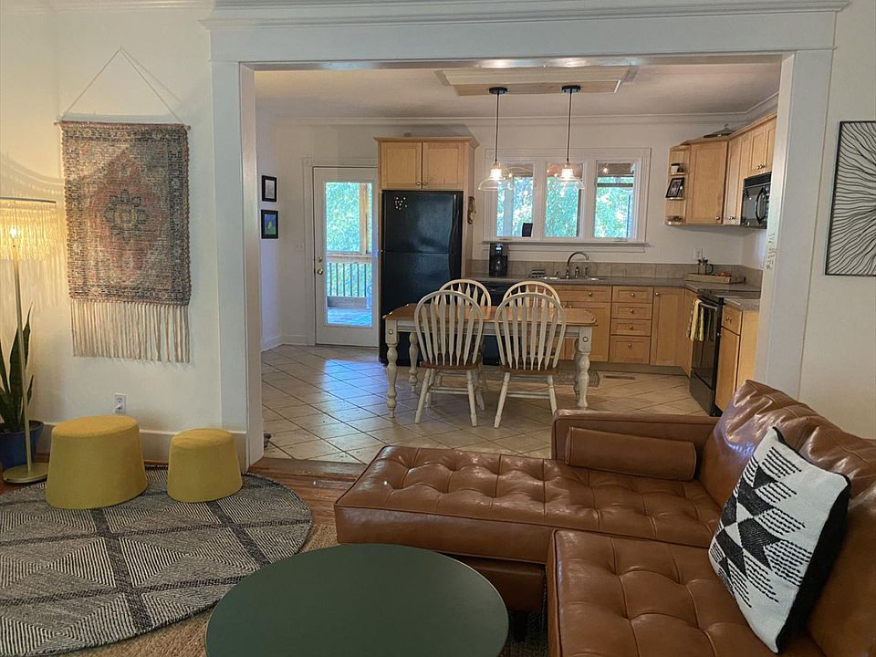 Living room open to the kitchen.