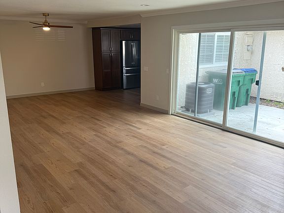 living and dining area with newly installed vinyl flooring