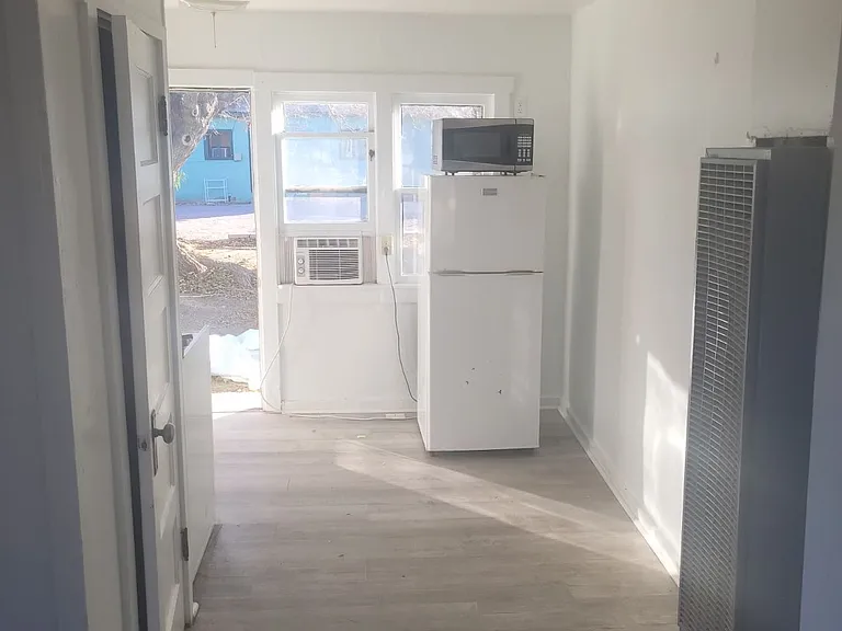 Back door entrance from off street parking