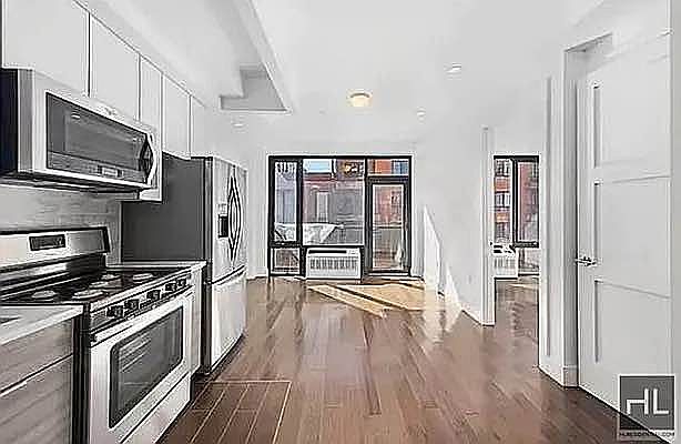 1st image of 399 E 8th St APT 8B