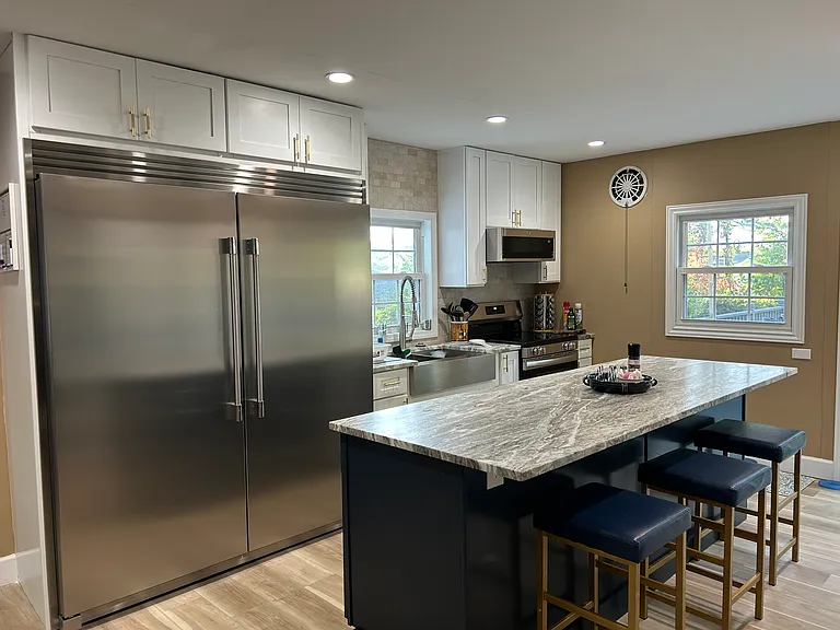 Large refrigerator in kitchen