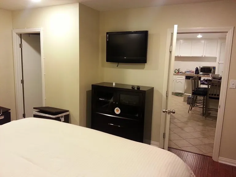 Master bedroom is on opposite side of the house from other bedrooms - off kitchen