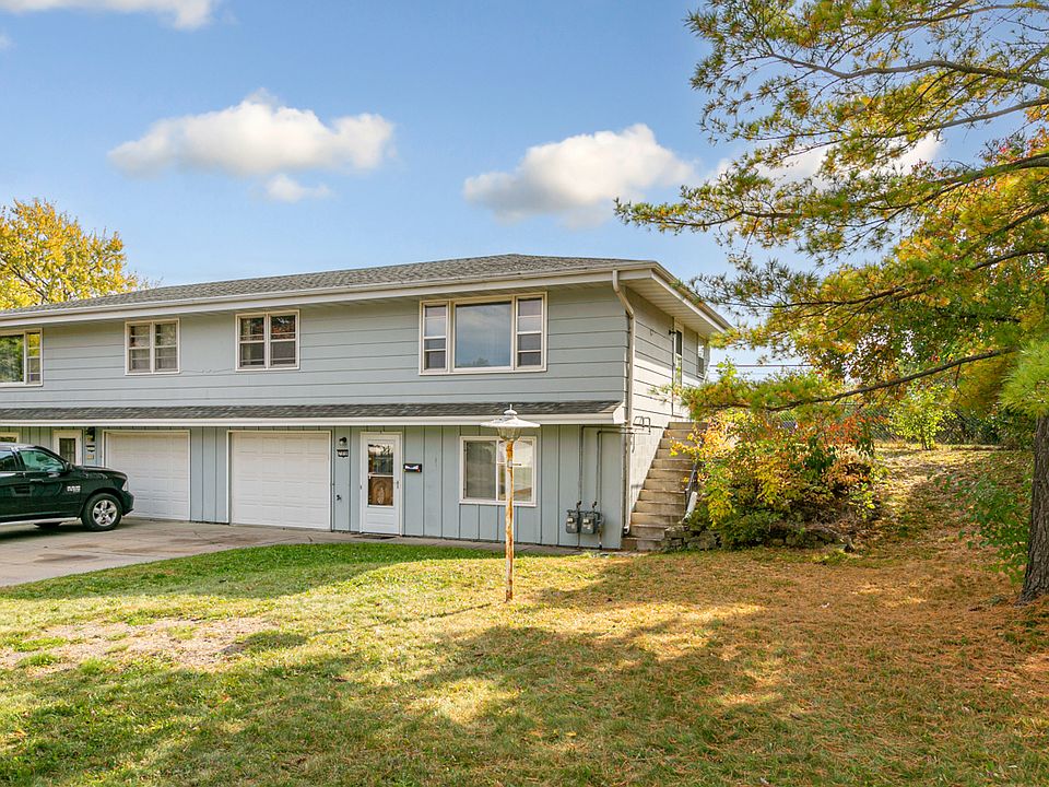 Side-by-side duplex. One car garage with long driveway for another car