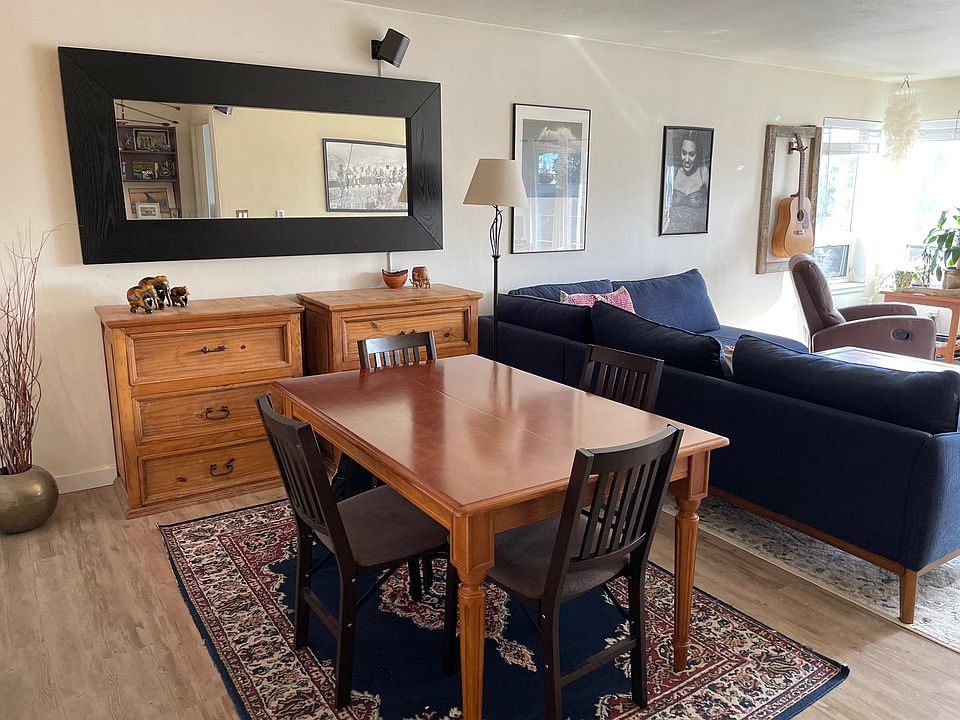 Dining space comfortably fits between living and kitchen areas