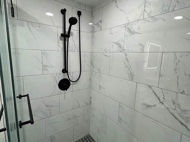 Lower level bathroom shower.