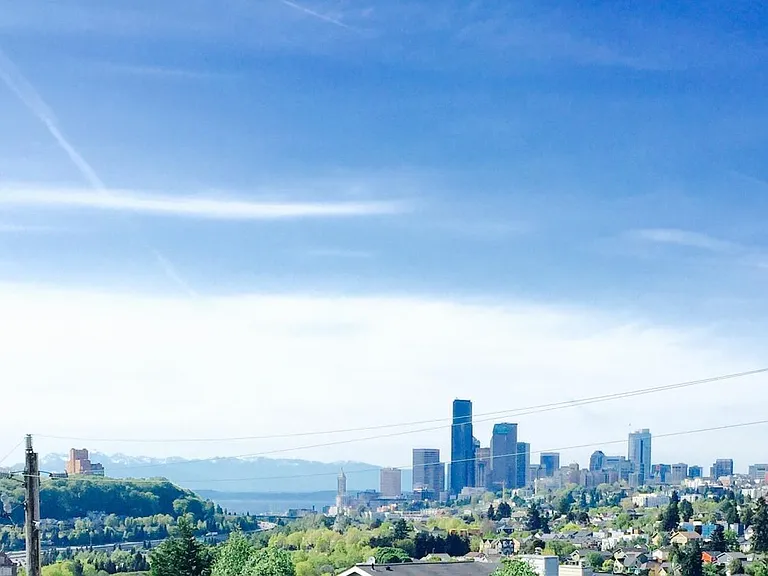 Commanding view of Downtown Seattle skyline and Elliott Bay.